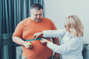 Fat Man with Doctor for Weight loss