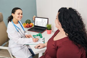 Medical Weight loss doctor plans meal plan for a female